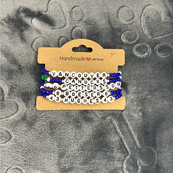 Handmade Canucks stretchy bracelets - pick 5 - Picture 1 of 3